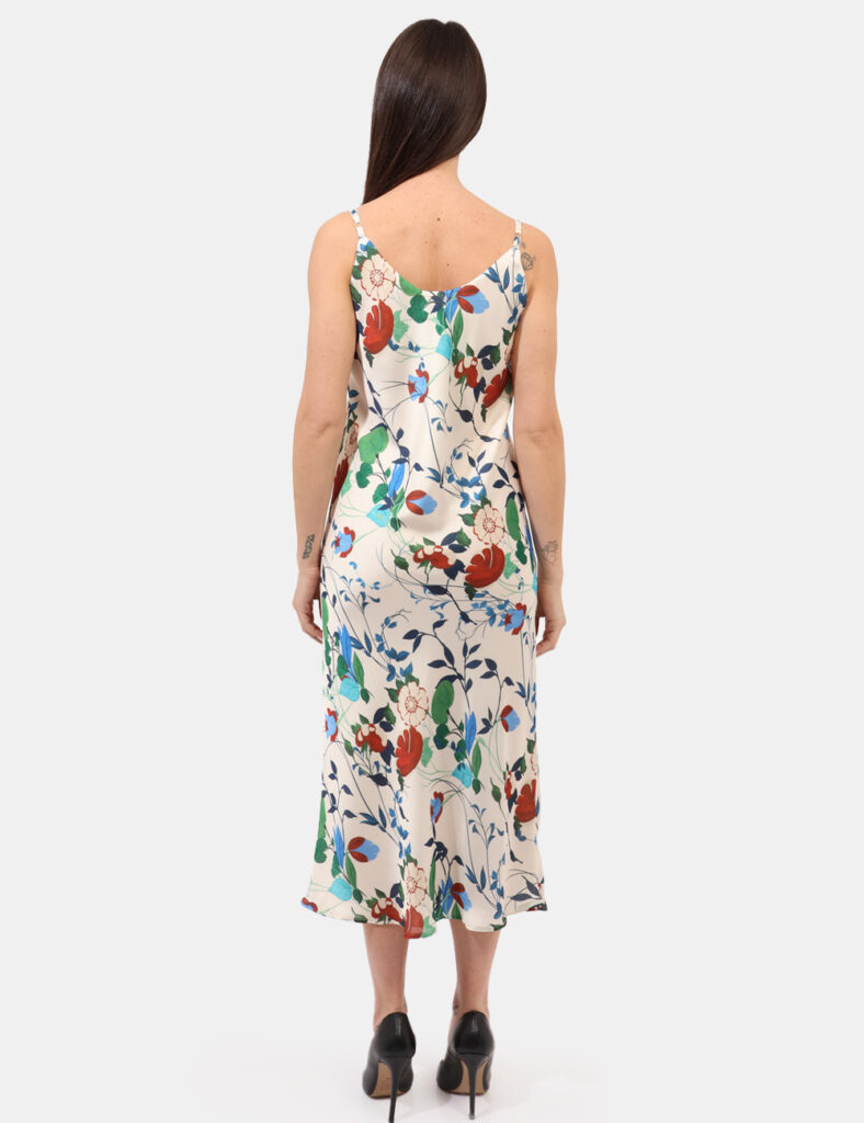 Vestito Materica Panna - Abito su base bianco panna e stampa floreale, con spalline strette e scollo a V. La vestibilità è m